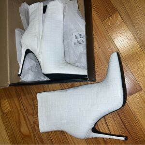 White Croc bootie. They were never worn.